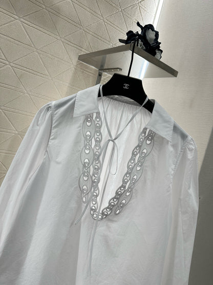 Elegant White Embroidered V-Neck Blouse