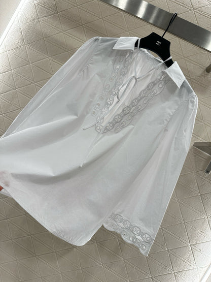 Elegant White Embroidered V-Neck Blouse